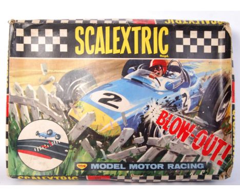An original vintage Scalextric 'Blow Out' set No. 40. Within the original box. Appears complete with both cars and controller