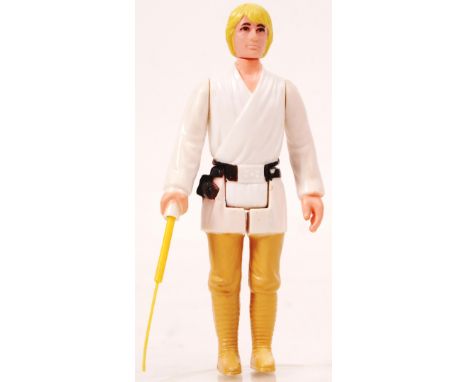 An incredibly rare first issue early release Star Wars Kenner made ' Luke Skywalker ' Farmboy variant action figure, complete