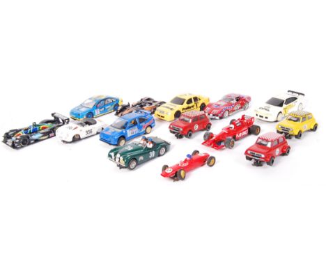 A collection of 14x slot racing cars - to include Scalextric, Hornby and Ninco. Some vintage. Unboxed. To include Mini's, Jag