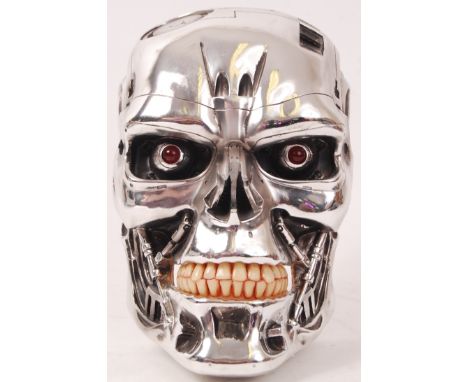 A Nemesis Now made prop replica Terminator 2 T-800 model head bust. Highly detailed replica. With light-up LED lights (batter
