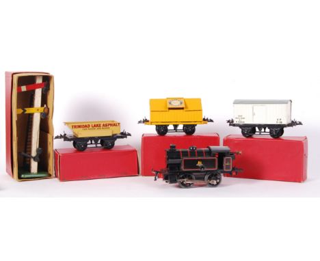 A collection of assorted vintage Hornby tinplate 0 gauge rolling stock / wagons etc. Comprising of: No.1 Rotary Tipping Wagon