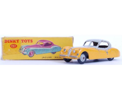 An original vintage Dinky diecast model 157 Jaguar XK 120 Coupe. Orange and grey, within the original box 