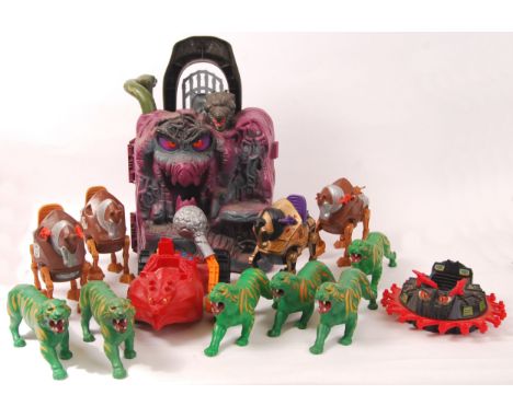 A collection of assorted vintage Mattel made Masters Of The Universe MOTU unboxed action figure vehicles etc. To include a Ca