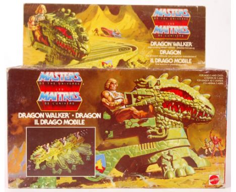 A vintage Mattel made Masters Of The Universe boxed ' Dragon Walker .' The box with all inner packing card, and the contents 