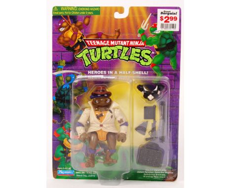 An original vintage Playmates Teenage Mutant Ninja Turtles carded 10 back action figure of  Don, The Undercover Turtle. The f