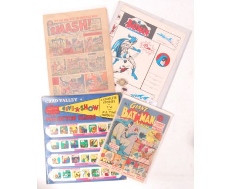 A collection of vintage Batman items to include; a very early gumball type machine Batman penny metal fronted watch with card