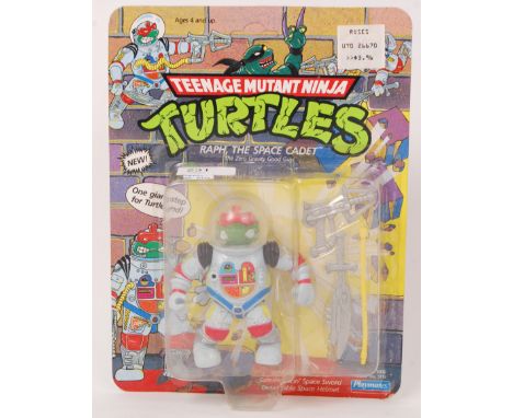 An original vintage Playmates Teenage Mutant Ninja Turtles carded 44 back action figure of Raph, The Space Cadet. The figure 