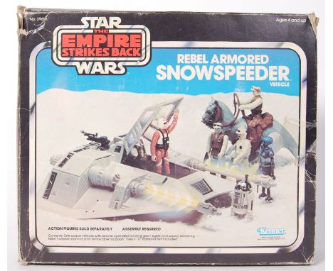 A vintage Star Wars Kenner made ' Rebel Armoured Snowspeeder Vehicle .' Within the original Empire Strikes Back box. 100% com
