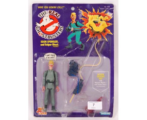 An original vintage retro Kenner The Real Ghostbusters carded first issue action figure ' Egon Spengler .' Carded, unused, on
