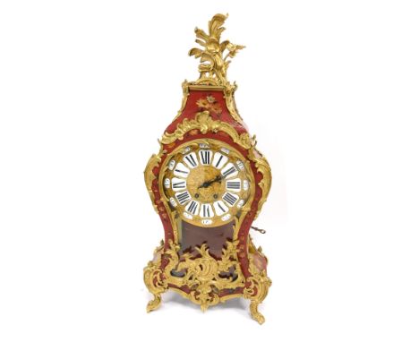 A French Louis XV style mantel clock, with hour glass shape, with gilt applied spandrels on a painted red floral panels, with
