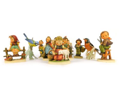 A collection of Goebel Hummel figures, and two Goebel birds. (11)