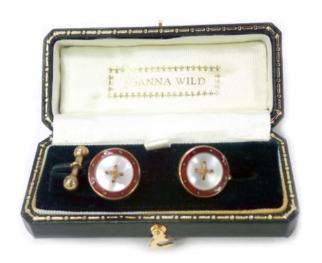 A pair of enamel gent's cufflinks, the circular head with a red enamel outer border and central mother of pearl panel, stampe