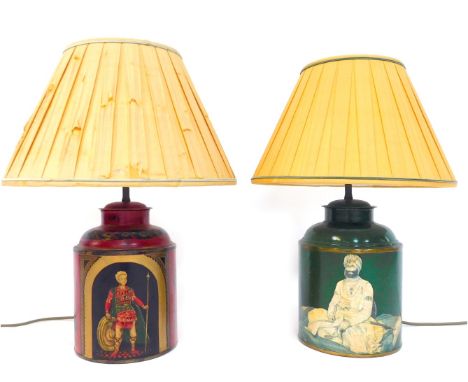Two painted tin lamp bases, depicting an armoured Roman figure against a black ground, 35cm high, and a further green example