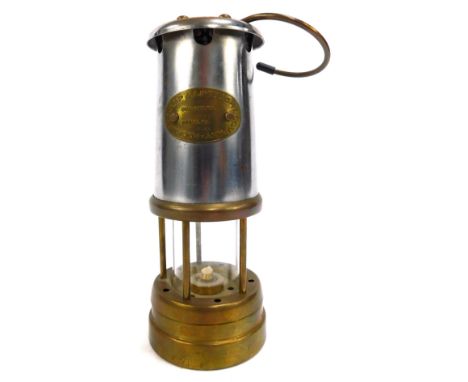 A Hockley Lamp &amp; Limelight Company miners lamp, Colliery No 8721, serial no 8064, with swing handles, 23cm high.