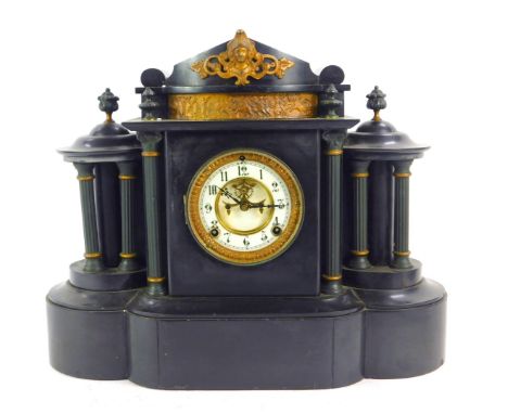 A 19thC black slate mantel clock, with Arabic numeral dial, enamelled chapter ring, eight day movement, the case of architect