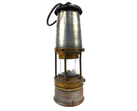 A Wolf Safety Lamp miners lamp, Maurice Ltd, Sheffield, No 7RMBS, with swing handle, 26cm high.