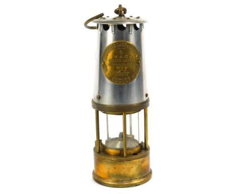 A Protectors Lamp &amp; Lighting Eccles miners lamp, Type 6, No 67, with swing handle, 22cm high.