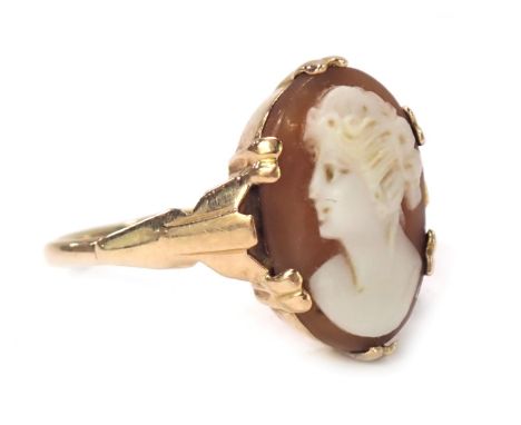 A 9ct gold shell cameo dress ring, with oval cameo depicting maiden on thin band, ring size L, 2g. 