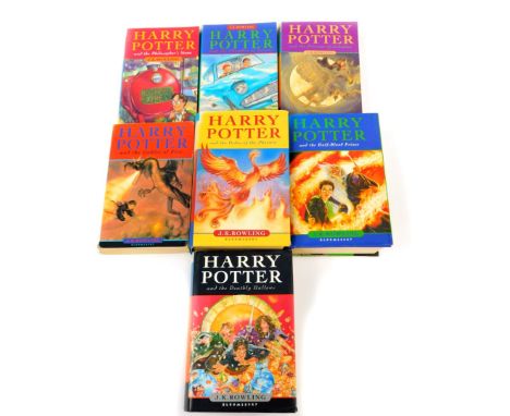 J K Rowling. A set of Harry Potter books, comprising The Philosophers Stone, paperback 1997, Goblet of Fire, paperback 2000, 