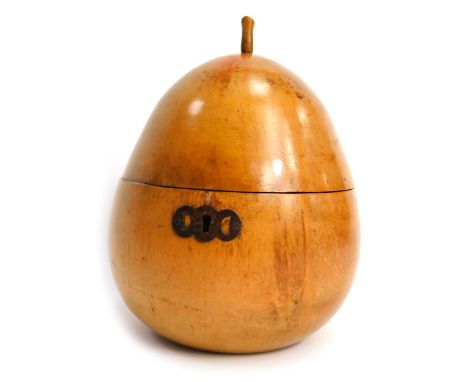 A Georgian treen fruitwood tea caddy, modelled as a pear with stalk finial, the hinged lid enclosing a vacant partially foile