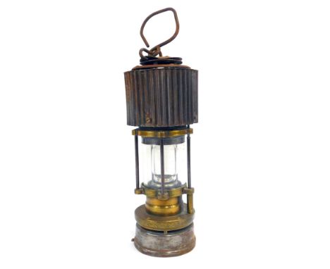 A Patterson Lamps miners lamp, with swing handle, 30cm high.