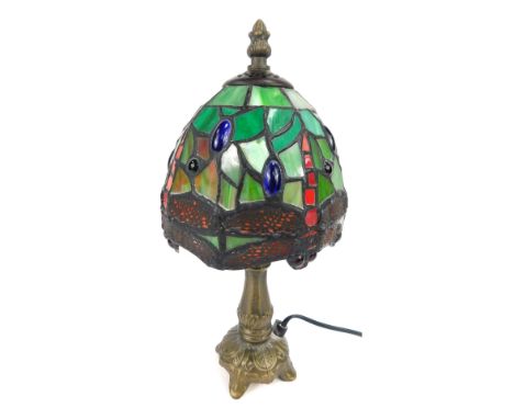 A Tiffany style small table lamp, with dragonfly green shade, 32cm high.