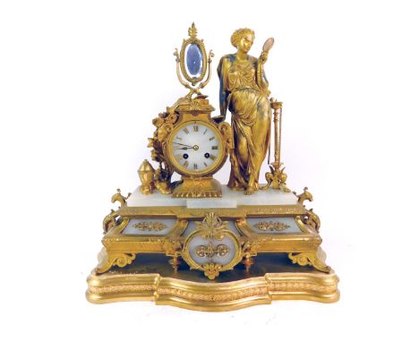 A 19thC French marble and gilt spelter mantel clock, with Roman numeric dial, eight day movement, the case surmounted by a fe