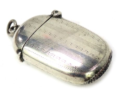 A George V silver match case, of oval form with engine turned decoration and vacant cartouche, Chester 1924, 0.59oz. 