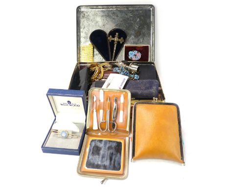 A quantity of costume jewellery, comprising floral brooches, bi spectacle lenses, crucifix pendant and chain, cased plated ra