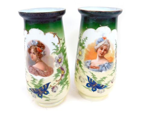 A pair of Victorian milk glass vases, of cylindrical tapering form, each decorated with a head and shoulders portrait of a la