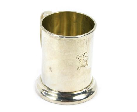 A white metal child's tankard, inscribed K, unmarked, 2.10oz. 