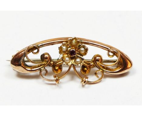 A Victorian 9ct rose gold garnet and half pearl floral scroll brooch, 33mm, 2.2gm 