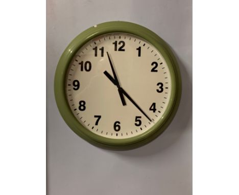 An Ikea 'Snugga' quartz wall clock, metal case with plastic front, white dial with Arabic numerals, diameter approx 60cm 