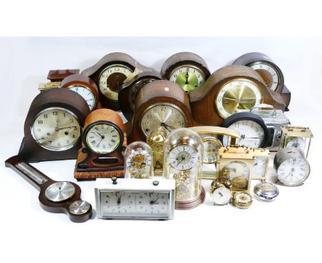 A collection of mid 20th century and later clocks, to include miniature novelty, traveling alarm clocks, carriage clocks and 