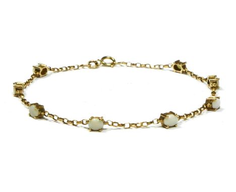 A 9ct gold and claw set opal line bracelet, 18cm, 2gm 