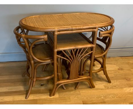 A rattan bistro style dining table &amp; chairs, consisting of a table with reed top and lower shelf, 100cm x 76cm x 53cm, to