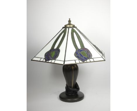 Tiffany style leaded and stained glass lamp, by Interiors 1900, of hexagonal form, raised on a bronzed metal baluster support
