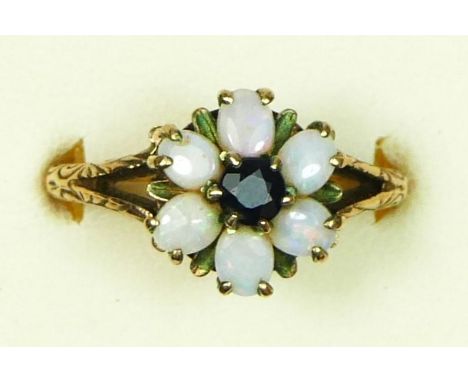 A 9ct gold sapphire and opal cluster ring, , carved shoulders, N, 4.2gm 