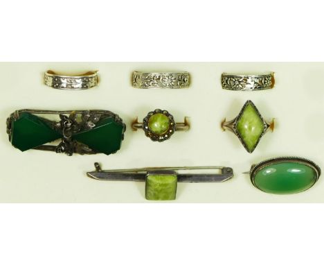 An Iona silver band ring, two other band rings, two silver and green agate rings and a matching brooch, and two silver and ch