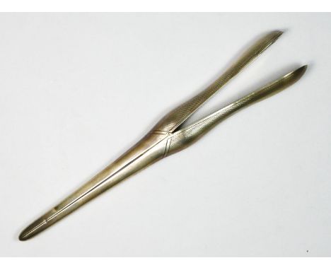 A silver pair of glove stretchers, London 1917, with engine turned decoration, 22.5cm 