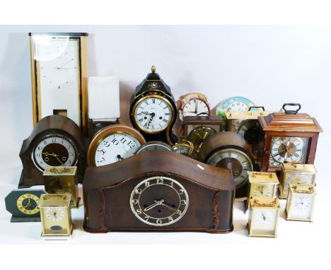 A collection of clocks in four boxes, to include mantel clocks, wall clocks, barometers, having manual and quartz movements, 
