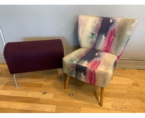 A contemporary armchair, graffiti street art upholstery, raised on spayed legs, H73cm, D64cm, together with a modern ottomans