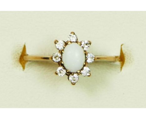 A 9ct gold opal and white stone cluster ring, E 1/2, 1.1gm 