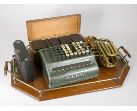 A Bell Punch Company Plus adding machines, together with a Kodak Autograph folding camera, a small brass trumpet, a collectio