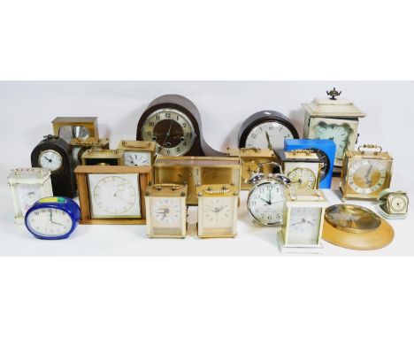 A collection of mid 20th clocks, to include five Vienna style wall clocks, a bakelite mantle clock and others. 