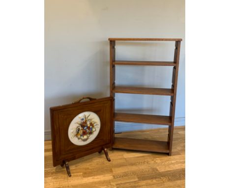 A four shelf freestanding bookcase, 70cm x 127cm x 28cm, together with a mahogany framed fire screen, with glazed dome front,