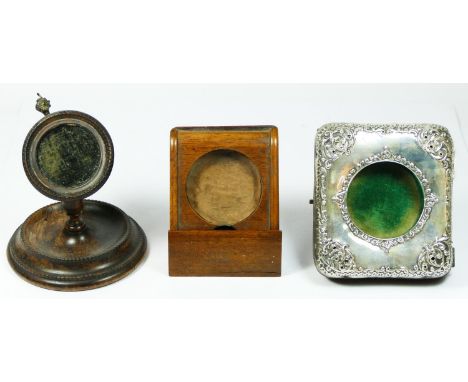 An Edwardian silver pocket watch easel case, Birmingham 1904 and two wooden pocket watch stands 