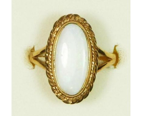 A 9ct gold opal dress ring, 15 x 7mm, Edinburgh 1989, M, 3.2gm 