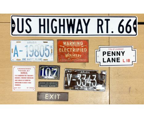 Nine pressed metal, enamel and plastic signs, to include Route 66, 107, Exit, Penny Lane and others (9) 