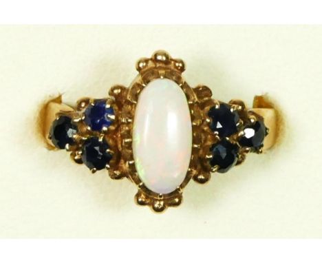 A 9ct gold, opal and sapphire dress ring, P, 3.8gm 